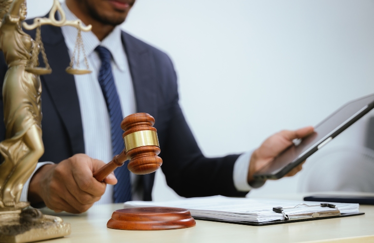 lawyer advises on legal matters, handling documents